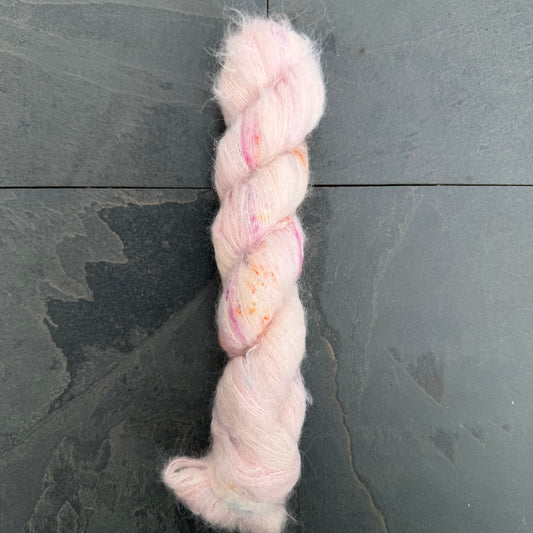 Pinky on Baby Suri Alpaca